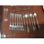 A set of six European silver cake forks - 800 marks; four hallmarked silver sugar nips - Sheffield &