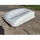 A rooftop car storage box with hinged lid, complete with four fixing brackets. (52in x 37in)