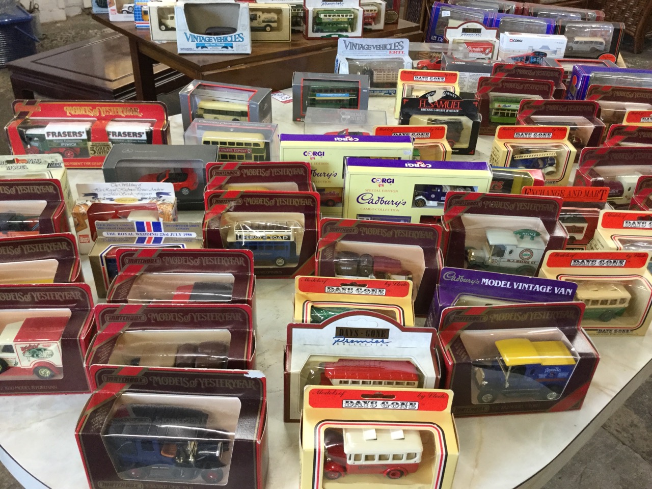 A collection of boxed model cars, vans, buses, lorries, etc., by Maychbox, Lledo, Days Gone,