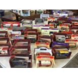 A collection of boxed model cars, vans, buses, lorries, etc., by Maychbox, Lledo, Days Gone,