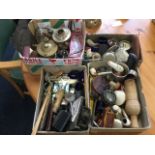 Four boxes of miscellaneous items including clay pipes, tins, penknives, scales, a 1943 compass,