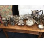 Miscellaneous silver plate including salvers, a four-piece teaset, tureens & covers, baskets, a