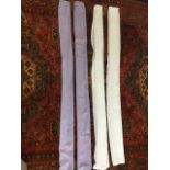 A pair of violet coloured voile curtains - 89in; and another white pair - 90in. (4)