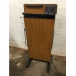 A Corby of Windsor electric trouser press on stand, with timer.