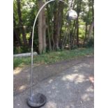 A designer Italian floor lamp, with circular polished marble base supporting chrome column with
