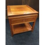 A square Chinese hardwood table, the panelled top above a fielded panelled box with frieze drawer,