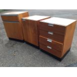 Three 70s teak kitchen units, having drawers and cupboards with aluminium trim mouldings &