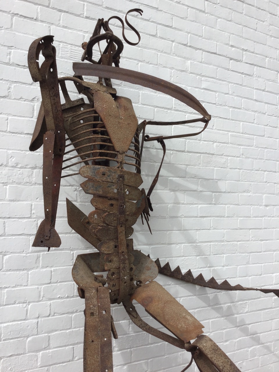 Lorna Logan, a wrought iron figural sculpture, the robotic-like man made from agricultural tools and - Image 2 of 3