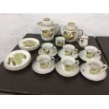 A Denby stoneware six-piece coffee/tea set with green floral decoration on cream ground, having