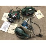 Four Bosch power tools - a planer, a sander, a router and a screwdriver. (4)