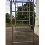 A galvanised scaffolding tower with eighteen 3ft sections rising to 27ft. (18)