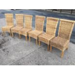 A set of six rush dining chairs, the high backs with shaped turned beech rails above box seats,