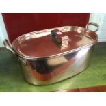 A rectangular rounded nineteenth century copper pan & cover with rolled rim, mounted with riveted
