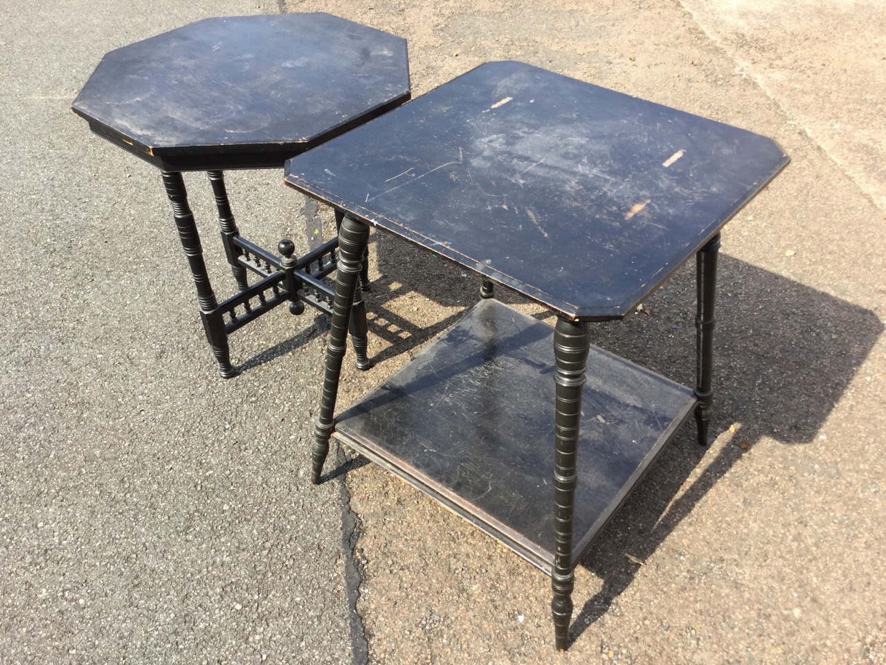 An late Victorian ebonised occasional table, the square top with canted corners raised on angled