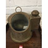 A brass ships binnacle, the domed case with oil lamp case to side, enclosing a gimbal mounted