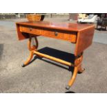 A reproduction yew sofa table, the crossbanded top with ebony stringing above two drawers, having
