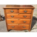 A stained late nineteenth century chest of drawers by The Scottish Co-op, with rectangular moulded