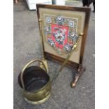 Two Victorian brass fire irons with ribbed handles - tongs & shovel; a beadwork firescreen with