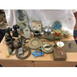 Two boxes of miscellaneous collectors items including a carved mould, a brass sundial, games, an