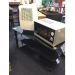 An Electriq dehumidifier on casters, complete with instructions; a Silver Crest microwave oven;