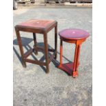 A modern circular mahogany occasional table, the crossbanded top above a frieze with drawer,