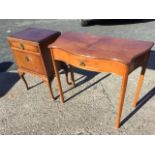 A serpentine fronted mahogany hall table with frieze drawer raised on chamfered legs; and a mahogany