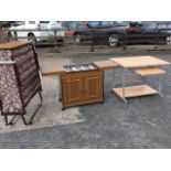 An Ecko hostess trolley with sliding top revealing four glass turrines, above a warming drawer