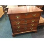 A Georgian mahogany secretaire chest, the moulded top above four cockbeaded oak lined drawers with