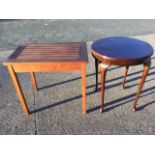 A rectangular teak garden table with slatted top on square column legs by RA Lister & Co Ltd; and