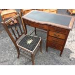 An Edwardian mahogany satinwood crossbanded desk, the moulded top with inset writing surface