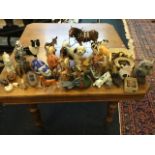 A collection of ceramic animals, birds, etc., some handpainted, Beswick horses, Sylvac, decoy duck