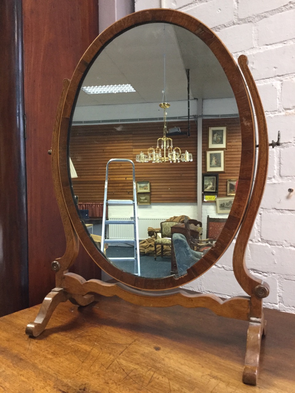 An oval nineteenth century mahogany dressing table mirror, the plate in crossbanded frame on - Image 2 of 3