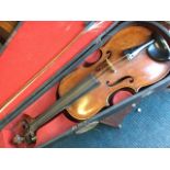 A coffin cased nineteenth century violin & bow with single piece back, unmarked & in need of