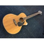 A Delta electro acoustic jumbo steel string guitar, with cedar soundboard and mahogany back, the