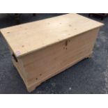 A Victorian pine blanket box of dovetailed construction having interior candlebox with two small