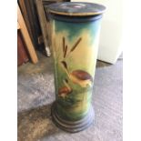 A Victorian tubular terracotta jardinière stand, the moulded lifting top above a column painted
