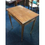 A mahogany side table, overall inlaid with chequered stringing, the rectangular top on square