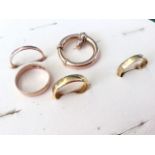 A 22ct gold wedding band; an 18ct gold wedding band; two 9ct gold wedding bands; and a circular gold