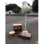 A painted & carved standard lamp with shade; an oval carved hardwood stool on turned legs; a