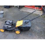 A McCulloch XC40 lawnmower with Briggs & Stratton petrol engine, the machine complete with grassbox.