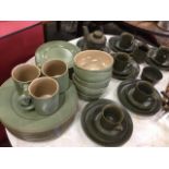 Ulster Ceramics - a green glazed six-piece stoneware set; and a Denby style six-piece ribbed matt