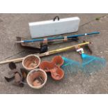 Miscellaneous garden tools including two new rake heads, spades, a fork, edge cutter, rakes,
