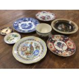 A Victorian Spode Newstone oriental pattern bowl; four handpainted Quimper pieces; a nineteenth