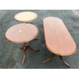 Three Welsh made mahogany occasional tables by Frenni of Dyfed, the moulded tops on turned columns