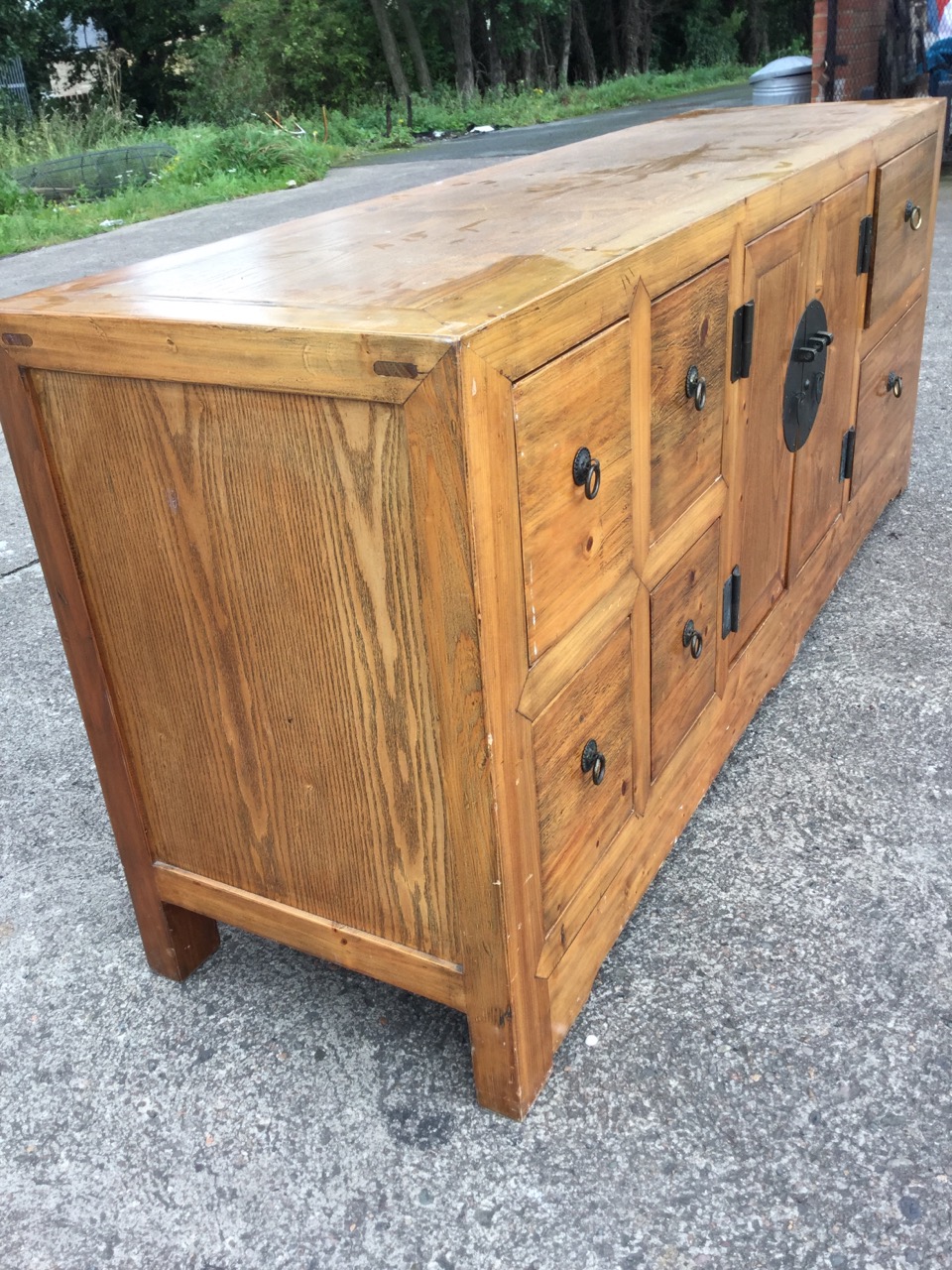 An oriental style sideboard with panelled top above central two-door cupboard mounted with - Image 3 of 3