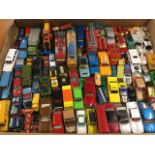 A collection of a Dinky, Corgi, and Matchbox cars, lorries, tractors, racing cars, wagons, buses,
