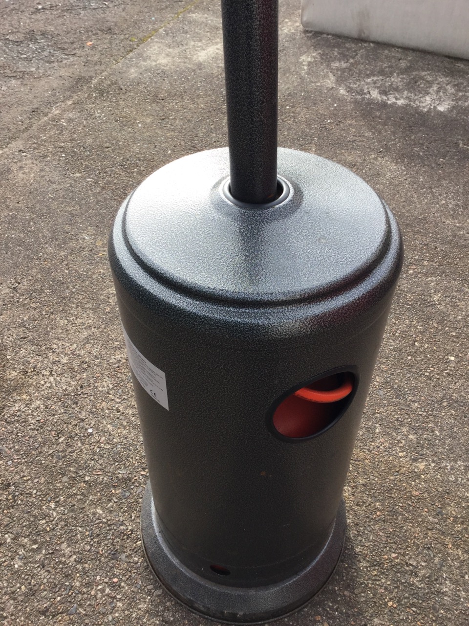 A gas patio heater with gauze reflector on column above a tubular base on casters, complete with a - Image 3 of 3