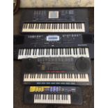 A Roland E-300 intelligent keyboard; and three Yamaha keyboards with miscellaneous effects. (4)