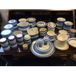 A collection of TG Green blue & white kitchen ware including labelled storage jars, salt & pepper
