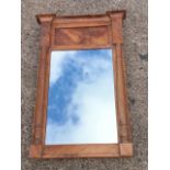 A Victorian mahogany hall mirror with breakfront moulded cornice above a rectangular panel, the